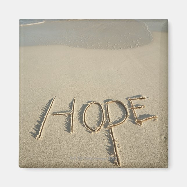 The word 'Hope' sand written on the beach with Magnet (Front)