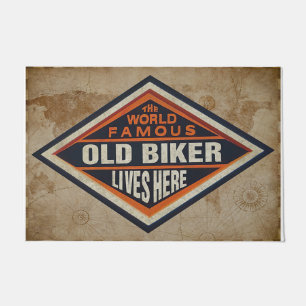 The World Famous Old Biker Lives Here Doormat