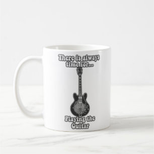 There is always time for playing the guitar. B&W Coffee Mug