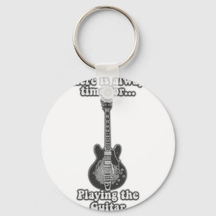 There is always time for playing the guitar. B&W Keychain