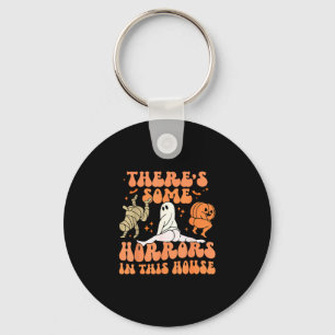 Theres some horrors in this house funny keychain