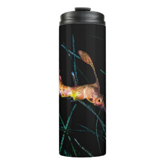 Thermal mug with sea dragon design