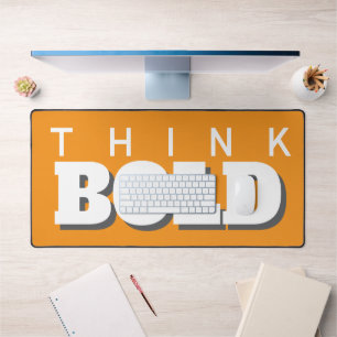 think bold orange desk mat