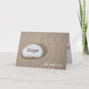 thinking of you-word Hope on rock in beach sand Card