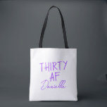 THIRTY AF Personalized Funny 30th Birthday Tote Bag<br><div class="desc">Celebrate turning 30 in bold style with this personalized “THIRTY AF” tote bag. Featuring vibrant purple text and your custom name in elegant script, this playful yet practical bag is perfect for birthday brunches, party essentials, or gift-giving flair. Whether you’re treating yourself or surprising your bestie, this tote adds sass...</div>