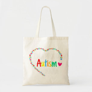 This colourful autism heart made with puzzle piece tote bag