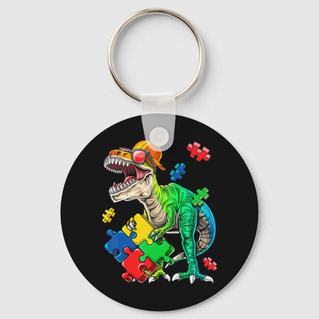 This dinosaur autism awareness top features a dino keychain (Front)