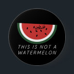 This is Not a Watermelon - Palestine watermelon  3 Inch Round Button<br><div class="desc">After the six-day war in 1967, the Israeli government banned the Palestinian flag. The watermelon took its place due to it sharing the colours of the flag: red, black, white, and green. the fruit can be seen from the stone walls of Gaza to the galleries of Ramallah, hinting at the...</div>