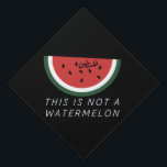 This is Not a Watermelon - Palestine watermelon Graduation Cap Topper<br><div class="desc">After the six-day war in 1967, the Israeli government banned the Palestinian flag. The watermelon took its place due to it sharing the colours of the flag: red, black, white, and green. the fruit can be seen from the stone walls of Gaza to the galleries of Ramallah, hinting at the...</div>