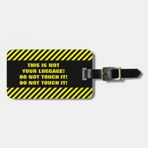 THIS IS NOT YOUR LUGGAGE! DO NOT TOUCH IT! LUGGAGE TAG