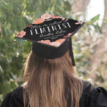 This is What a Feminist Looks Like  | Custom Graduation Cap Topper<br><div class="desc">Cute grad cap topper features the quote "this is what a feminist looks like" in white hand lettering on a black background adorned with blush pink and peach flowers. Personalize with your class year and/or school.</div>