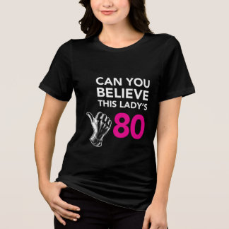 This lady is 80 Tri-Blend shirt