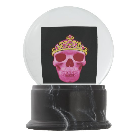 This pink princess skull wearing a tiara is sure t snow globe