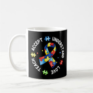This tee with autism puzzle slogan "Teach Accept U Coffee Mug