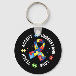 This tee with autism puzzle slogan "Teach Accept U Keychain
