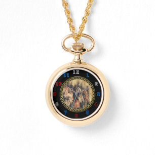 Thoroughbred horses running in a field watch