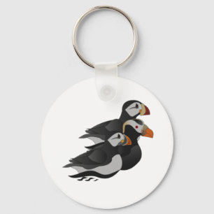 Three Adorably Friendly Puffins Swimming Cartoon Keychain