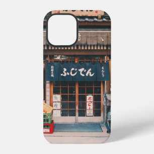 THREE BICYCLES PARKED IN FRONT OF BUILDING iPhone 12 CASE