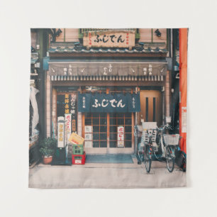 THREE BICYCLES PARKED IN FRONT OF BUILDING TAPESTRY