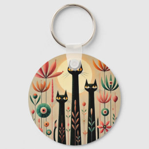 Three Black Cats Amid Vibrant Floral Design Keychain