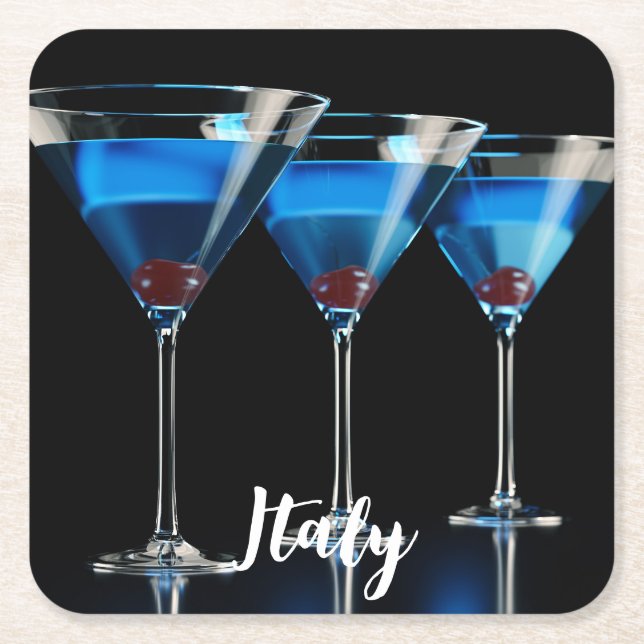 Three blue cocktails with cherry on black square paper coaster (Front)