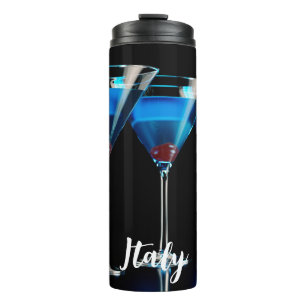 Three blue cocktails with cherry on black thermal tumbler