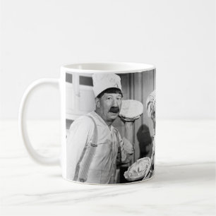 Three chefs holding pies for a fight in the kitche coffee mug