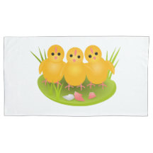 Three chicklings with egg shell