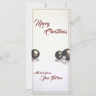 Three christmas balls in front of light background