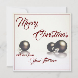 Three christmas balls in front of light background