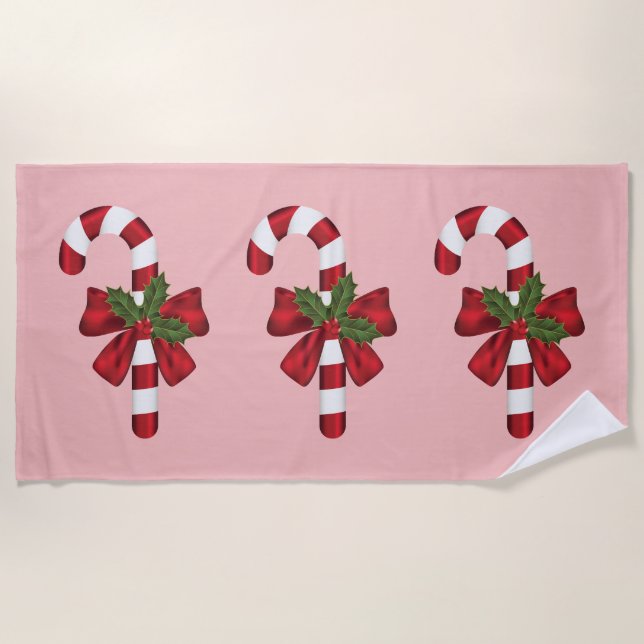 Three Christmas Candy Canes On Pink Beach Towel (Front)