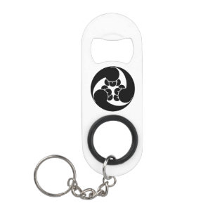 Three clockwise clove swirls mini bottle opener