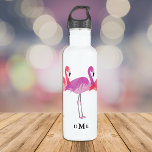 Three Colourful Flamingos Monogram 710 Ml Water Bottle<br><div class="desc">This water bottle features three watercolor image flamingos,  all lined up. Colours include pink and violet. Your triple letter monogram is in black at the bottom centre. Bright and colourful! *Thanks to ClipArtBrat for the flamingo images in this design.</div>