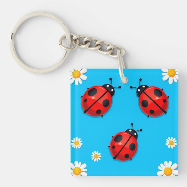 Three Colourful Ladybugs on Blue Background Keychain (Front)