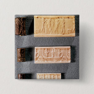 Three cylinder seals with impressions, 2 inch square button