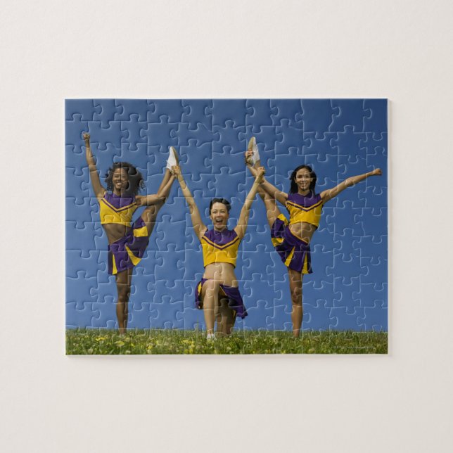 Three female cheerleaders doing formation jigsaw puzzle (Horizontal)