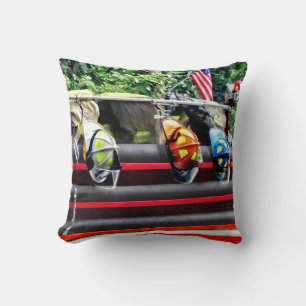 Three Fire Helmets On Fire Truck Throw Pillow