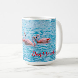 Three flamingos on the Laguna Amarga Coffee Mug