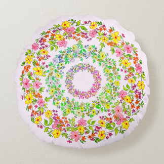 Three floral wreaths round pillow