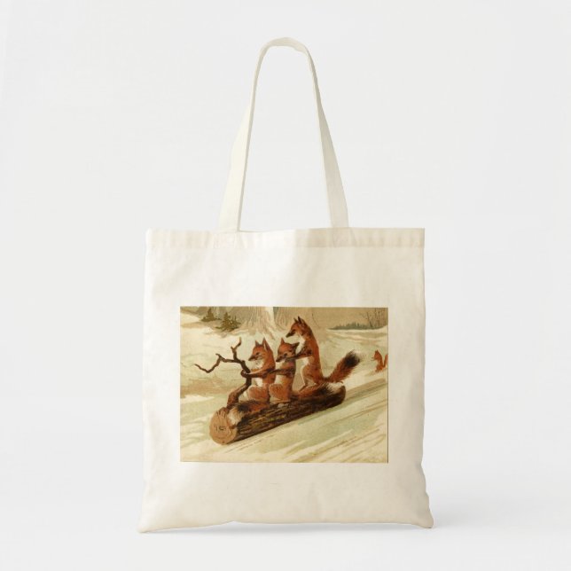 Three Foxes Sledding on a Log Tote Bag (Front)