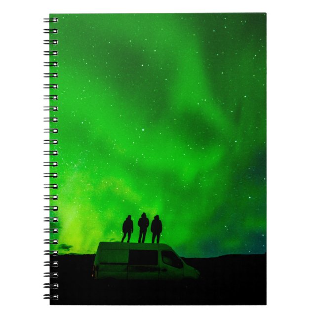Three friends on an epic journey in their camper v notebook (Front)