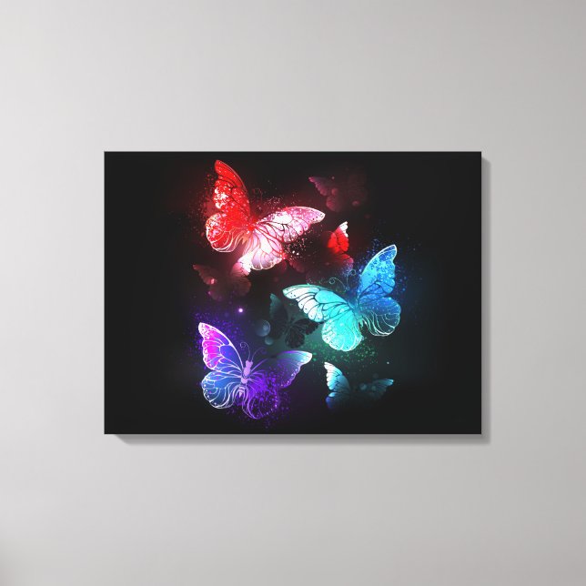 Three Glowing Butterflies on night background Canvas Print (Front)