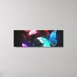 Three Glowing Butterflies on night background Canvas Print
