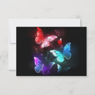 Three Glowing Butterflies on night background Card