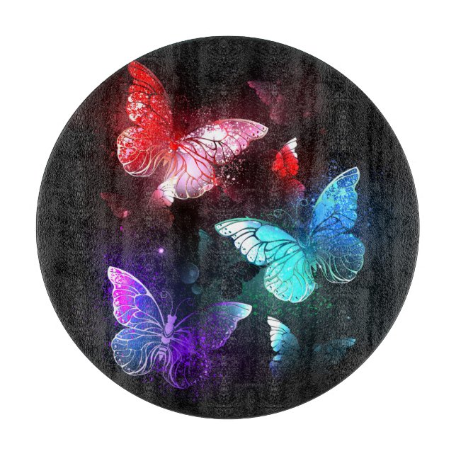 Three Glowing Butterflies on night background Cutting Board (Front)
