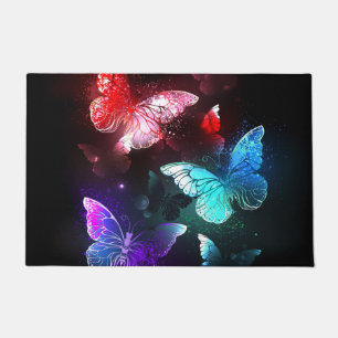 Three Glowing Butterflies on night background Doormat