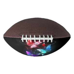 Three Glowing Butterflies on night background Football
