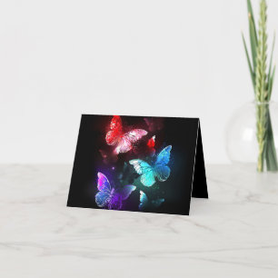 Three Glowing Butterflies on night background Holiday Card