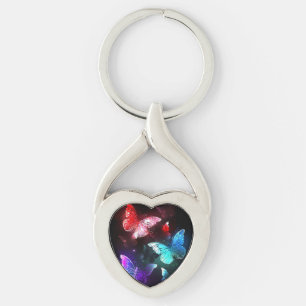 Three Glowing Butterflies on night background Keychain