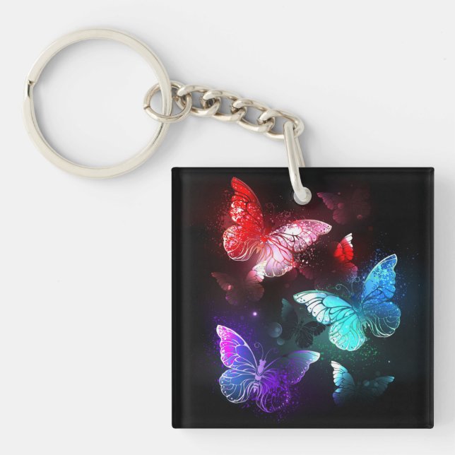 Three Glowing Butterflies on night background Keychain (Front)